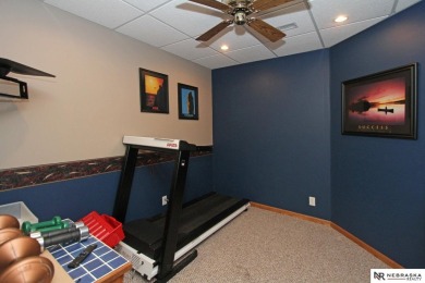 Beautiful all-brick ranch by Kinning Sydow featuring 4 bedrooms on Woodland Hills Golf Course in Nebraska - for sale on GolfHomes.com, golf home, golf lot