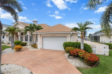 NEVER FLOODED ON THE INSIDE! LOW FLOOD INSURANCE COSTS! This on Royal Tee Country Club in Florida - for sale on GolfHomes.com, golf home, golf lot