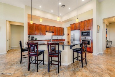 Live like you're on vacation every day in this stunning home on on Tuscany Falls At Pebble Creek in Arizona - for sale on GolfHomes.com, golf home, golf lot