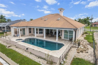 NEVER FLOODED ON THE INSIDE! LOW FLOOD INSURANCE COSTS! This on Royal Tee Country Club in Florida - for sale on GolfHomes.com, golf home, golf lot