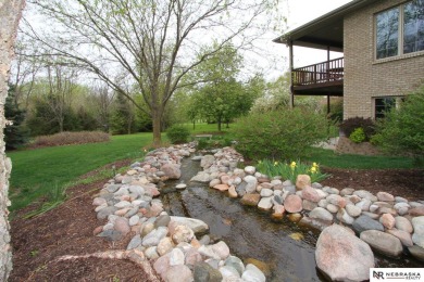 Beautiful all-brick ranch by Kinning Sydow featuring 4 bedrooms on Woodland Hills Golf Course in Nebraska - for sale on GolfHomes.com, golf home, golf lot