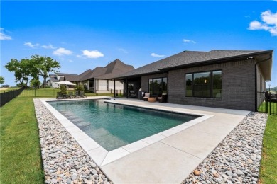 Right on the 14th fairway with a front-row view and a heated on Shadow Valley Country Club in Arkansas - for sale on GolfHomes.com, golf home, golf lot