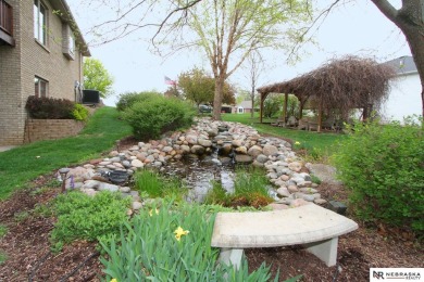 Beautiful all-brick ranch by Kinning Sydow featuring 4 bedrooms on Woodland Hills Golf Course in Nebraska - for sale on GolfHomes.com, golf home, golf lot