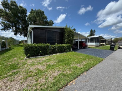 Don't miss this immaculate 2/2, 1248 sf home in the highly on Lake Henry Golf Club in Florida - for sale on GolfHomes.com, golf home, golf lot