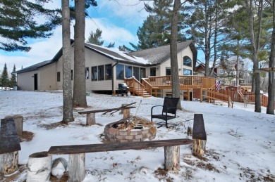 EAGLE RIVER CHAIN!! This stunning 6-bedroom, 3-bathroom home on Eagle River Golf Course in Wisconsin - for sale on GolfHomes.com, golf home, golf lot