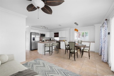 20 miles from the bustle of metro Honolulu is Ka Makana at on Hoakalei Country Club At Ocean Pointe in Hawaii - for sale on GolfHomes.com, golf home, golf lot