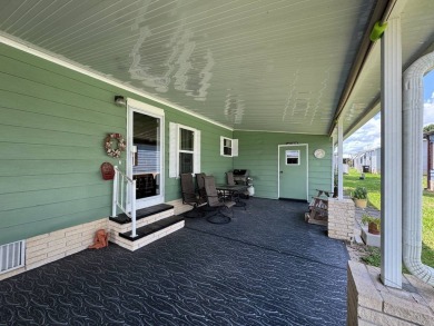 Don't miss this immaculate 2/2, 1248 sf home in the highly on Lake Henry Golf Club in Florida - for sale on GolfHomes.com, golf home, golf lot