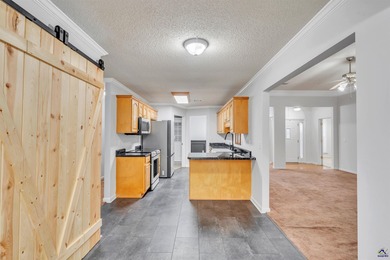 Welcome to this spacious 4-bedroom, 2-bath home in the highly on The International City Golf Course in Georgia - for sale on GolfHomes.com, golf home, golf lot