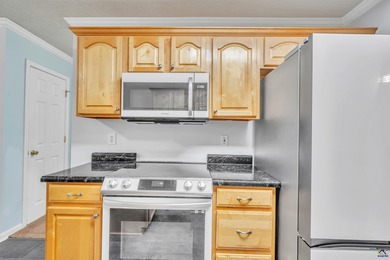 Welcome to this spacious 4-bedroom, 2-bath home in the highly on The International City Golf Course in Georgia - for sale on GolfHomes.com, golf home, golf lot