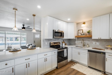 This Sun City stunner has been completely transformed from top on Sun City North Golf Course in Arizona - for sale on GolfHomes.com, golf home, golf lot