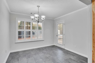 Welcome to this spacious 4-bedroom, 2-bath home in the highly on The International City Golf Course in Georgia - for sale on GolfHomes.com, golf home, golf lot