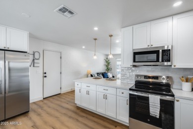 This Sun City stunner has been completely transformed from top on Sun City North Golf Course in Arizona - for sale on GolfHomes.com, golf home, golf lot