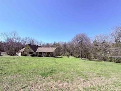 4-bedroom, 3-bath home on approximately 0.69 acres with a wet on Cherokee Village North Course in Arkansas - for sale on GolfHomes.com, golf home, golf lot