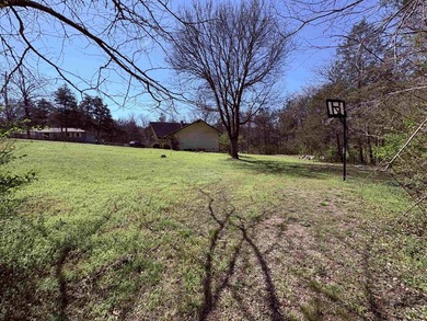 4-bedroom, 3-bath home on approximately 0.69 acres with a wet on Cherokee Village North Course in Arkansas - for sale on GolfHomes.com, golf home, golf lot