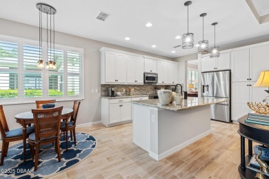 Welcome to Perfection in Paradise! This amazing Parrot model is on LPGA International Golf Course in Florida - for sale on GolfHomes.com, golf home, golf lot