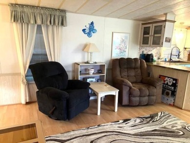 Welcome to your perfect seasonal escape! This 2-bedroom on Crystal Lake Club in Florida - for sale on GolfHomes.com, golf home, golf lot