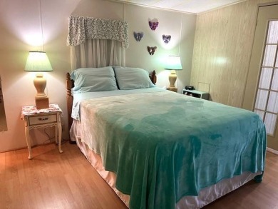 Welcome to your perfect seasonal escape! This 2-bedroom on Crystal Lake Club in Florida - for sale on GolfHomes.com, golf home, golf lot