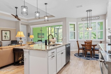Welcome to Perfection in Paradise! This amazing Parrot model is on LPGA International Golf Course in Florida - for sale on GolfHomes.com, golf home, golf lot