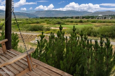 This custom home sits off the 10th green with views of the back on Grand Elk Ranch and Club in Colorado - for sale on GolfHomes.com, golf home, golf lot