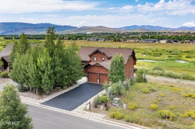 This custom home sits off the 10th green with views of the back on Grand Elk Ranch and Club in Colorado - for sale on GolfHomes.com, golf home, golf lot