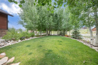 This custom home sits off the 10th green with views of the back on Grand Elk Ranch and Club in Colorado - for sale on GolfHomes.com, golf home, golf lot