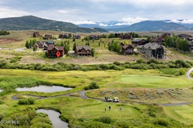 This custom home sits off the 10th green with views of the back on Grand Elk Ranch and Club in Colorado - for sale on GolfHomes.com, golf home, golf lot