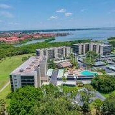 A View to Die For!  Discover the perfect blend of luxury and on Cove Cay Country Club in Florida - for sale on GolfHomes.com, golf home, golf lot