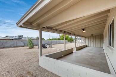 This Sun City stunner has been completely transformed from top on Sun City North Golf Course in Arizona - for sale on GolfHomes.com, golf home, golf lot