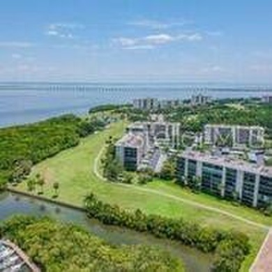 A View to Die For!  Discover the perfect blend of luxury and on Cove Cay Country Club in Florida - for sale on GolfHomes.com, golf home, golf lot