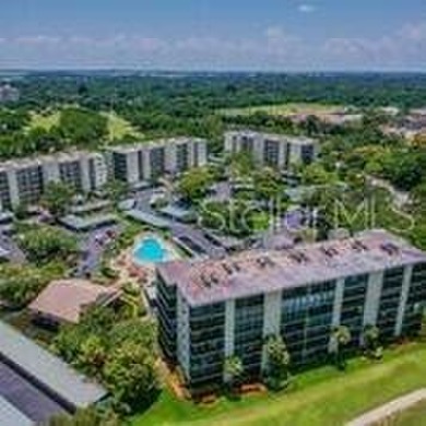 A View to Die For!  Discover the perfect blend of luxury and on Cove Cay Country Club in Florida - for sale on GolfHomes.com, golf home, golf lot