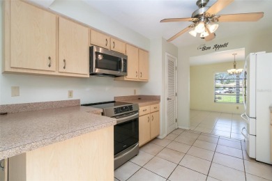 CHARMING 2 Bedroom, 2 Bathroom, 2 Car Garage, Pool home with a on Deep Creek Golf Club in Florida - for sale on GolfHomes.com, golf home, golf lot