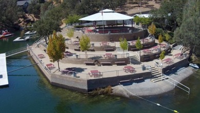 Ready to build lot with Peek-a-Boo views of the lake and on The Club at Copper Valley Golf Course in California - for sale on GolfHomes.com, golf home, golf lot