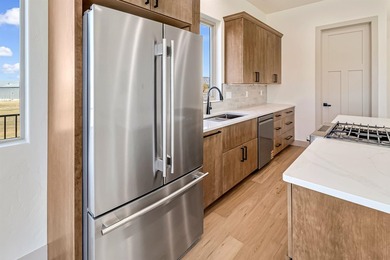 Brand new construction backing directly to the beautiful Chipeta on Chipeta Golf Course At Orchard Mesa in Colorado - for sale on GolfHomes.com, golf home, golf lot