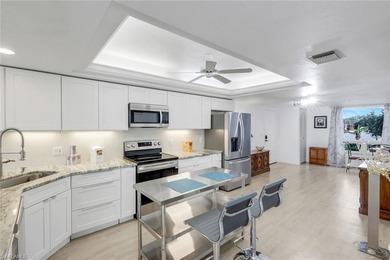 Don't miss seeing this bright and airy 2-bedroom 2-bath home on Bonita Bay West in Florida - for sale on GolfHomes.com, golf home, golf lot