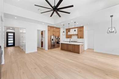 Welcome friends and family into this newly built home with open on Sunbrook Golf Course in Utah - for sale on GolfHomes.com, golf home, golf lot