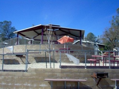 Ready to build lot with Peek-a-Boo views of the lake and on The Club at Copper Valley Golf Course in California - for sale on GolfHomes.com, golf home, golf lot