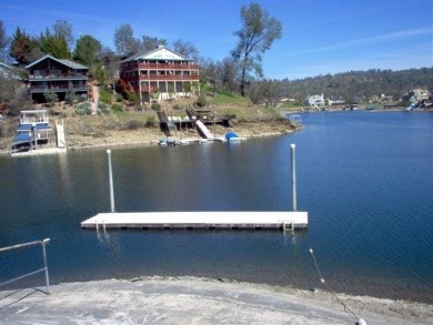 Ready to build lot with Peek-a-Boo views of the lake and on The Club at Copper Valley Golf Course in California - for sale on GolfHomes.com, golf home, golf lot