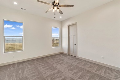 Brand new construction backing directly to the beautiful Chipeta on Chipeta Golf Course At Orchard Mesa in Colorado - for sale on GolfHomes.com, golf home, golf lot