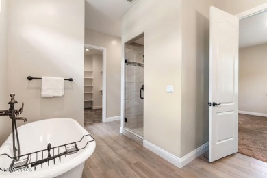 Privacy & Location: Move-in ready luxury, like-new, single story on Somersett Country Club in Nevada - for sale on GolfHomes.com, golf home, golf lot