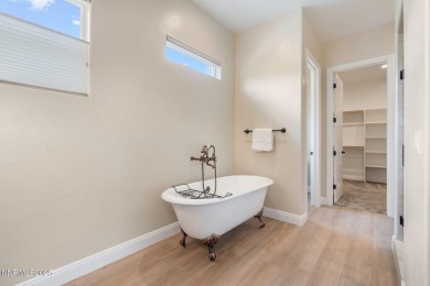 Privacy & Location: Move-in ready luxury, like-new, single story on Somersett Country Club in Nevada - for sale on GolfHomes.com, golf home, golf lot