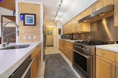 Spacious, updated townhome situated on the 11th tee box of the on Eagle Vail Golf Course in Colorado - for sale on GolfHomes.com, golf home, golf lot