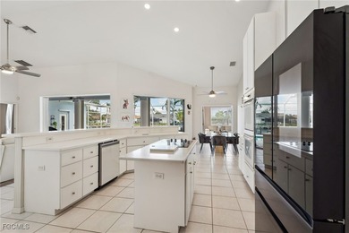 PRIME SW CAPE CORAL LOCATION! This home boasts almost 2,500 sq on Royal Tee Country Club in Florida - for sale on GolfHomes.com, golf home, golf lot