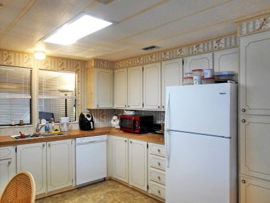 Rolling Greens Village is a friendly resort-style 55+ community on Rolling Greens Executive Golf Community in Florida - for sale on GolfHomes.com, golf home, golf lot