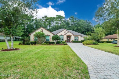 Elegant 4BR/3BA Gated with Guarded on .97 acre! A Beautifully on Country Club of Orange Park in Florida - for sale on GolfHomes.com, golf home, golf lot