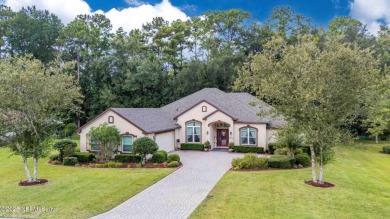 Elegant 4BR/3BA Gated with Guarded on .97 acre! A Beautifully on Country Club of Orange Park in Florida - for sale on GolfHomes.com, golf home, golf lot