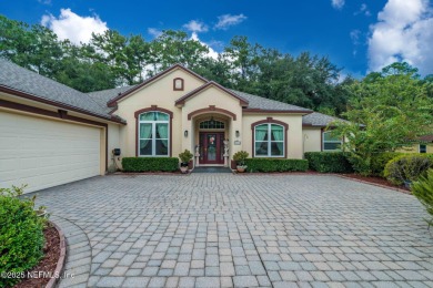 Elegant 4BR/3BA Gated with Guarded on .97 acre! A Beautifully on Country Club of Orange Park in Florida - for sale on GolfHomes.com, golf home, golf lot