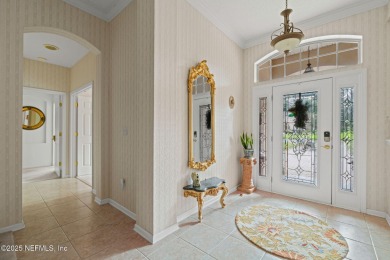 Elegant 4BR/3BA Gated with Guarded on .97 acre! A Beautifully on Country Club of Orange Park in Florida - for sale on GolfHomes.com, golf home, golf lot
