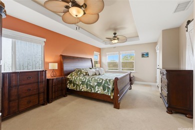 A WOW factor backyard, a main level bedroom w/full bath, and a on Hoakalei Country Club At Ocean Pointe in Hawaii - for sale on GolfHomes.com, golf home, golf lot