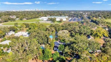 Discover this stunning bungalow, walkable to Gulfport! Step into on Twin Brooks Golf Course in Florida - for sale on GolfHomes.com, golf home, golf lot