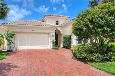 Nestled within the prestigious Pelican Marsh, this recently on Pelican Marsh Golf Club in Florida - for sale on GolfHomes.com, golf home, golf lot
